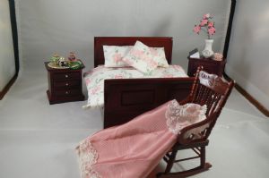 Dressed Bed with Bedside Cupboards and Chair