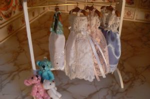 Handmade Dress Rail and Baby Dresses